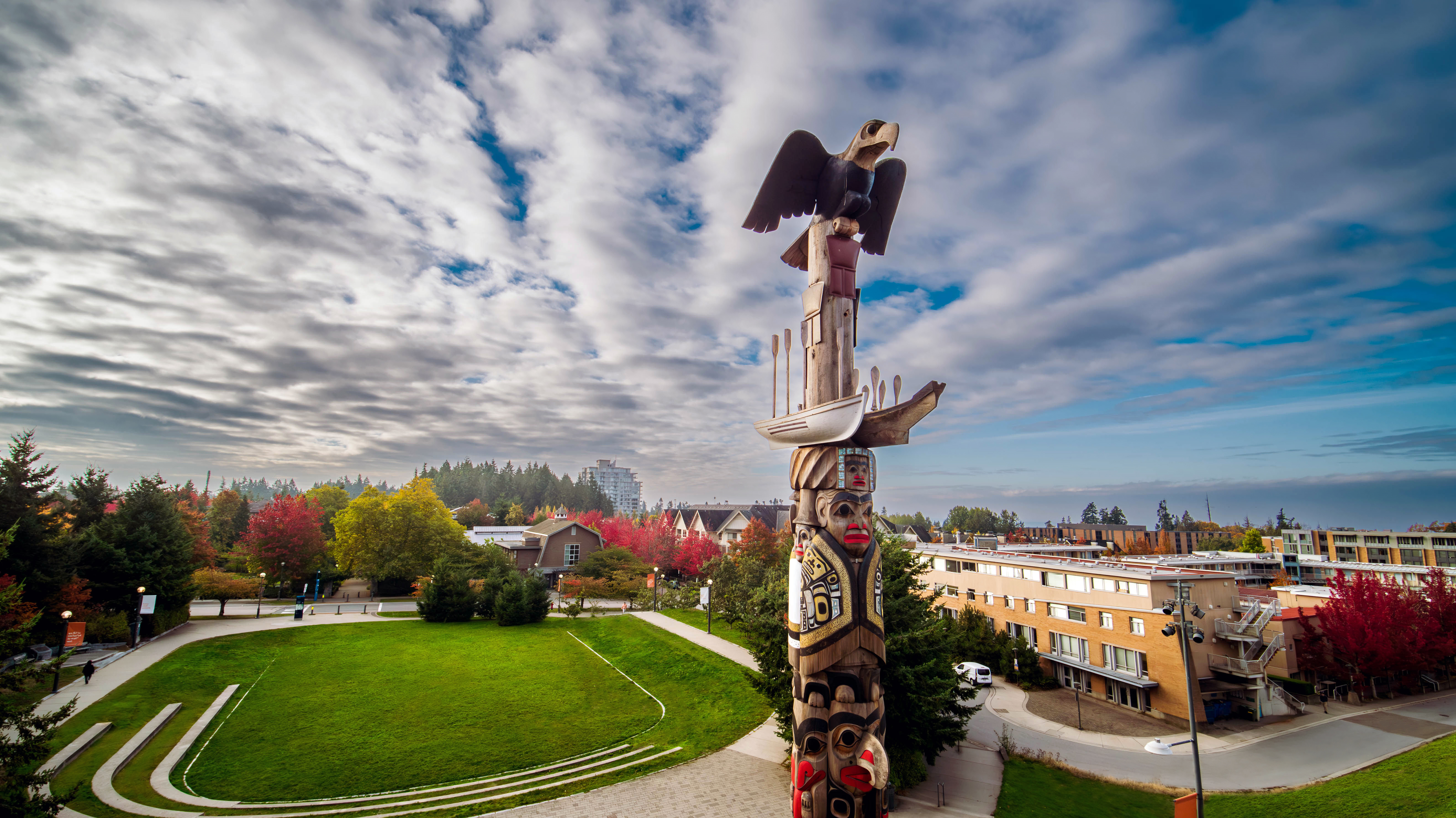 Above: Aerial photo of the Reconciliation Pole carved by Haida chief 7idansuu (James Hart).