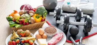 Photo of healthy food and exercise equipment 