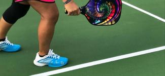 Image of person playing pickleball