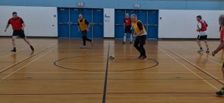 Seniors playing soccer