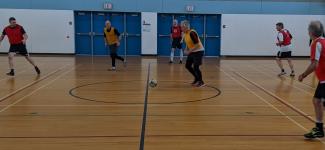Seniors playing soccer