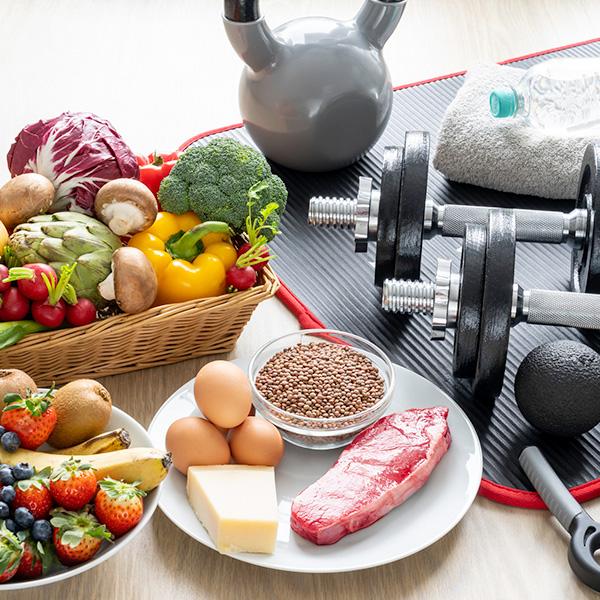 Photo of healthy food and exercise equipment 