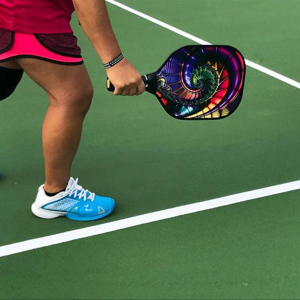 Image of person playing pickleball