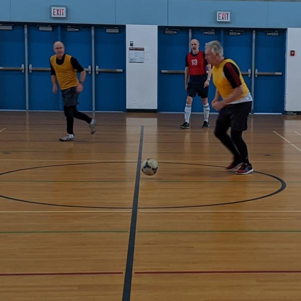 Seniors playing soccer